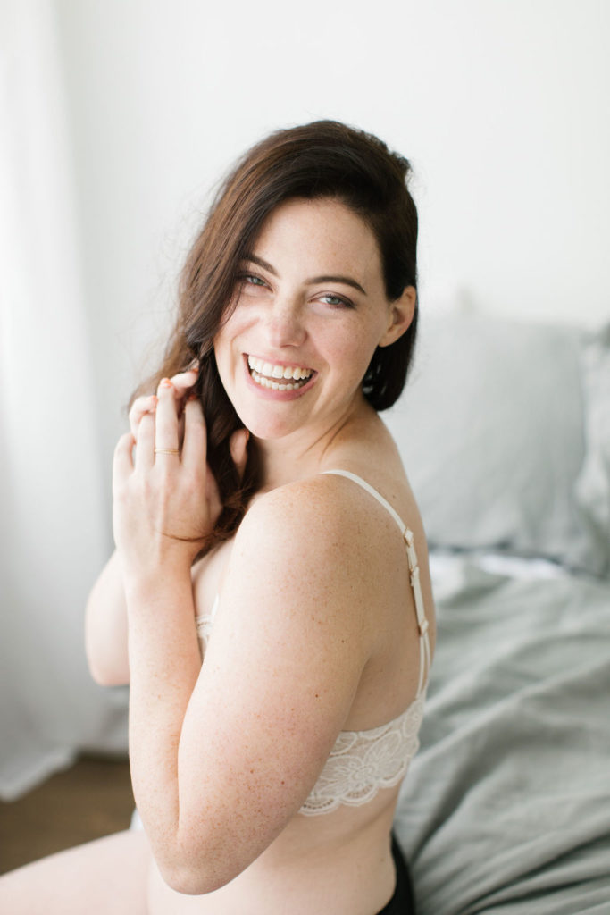 woman smiling during boudoir 